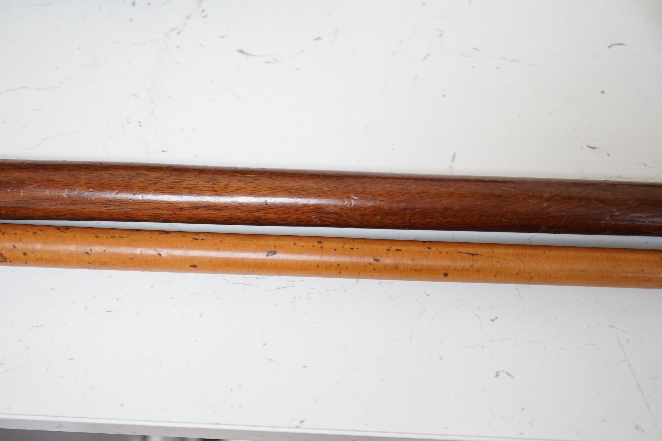 A yellow metal overlay topped walking stick, 91cms long and another (2)